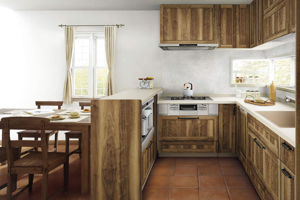 収納を兼ねたカウンターを併設したL型キッチンの写真