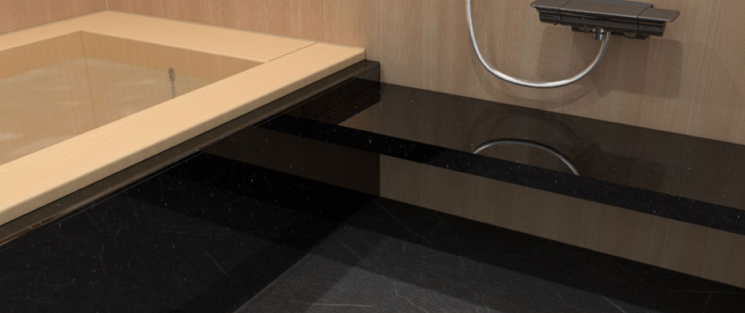 ヒノキと御影石を使った浴室の写真