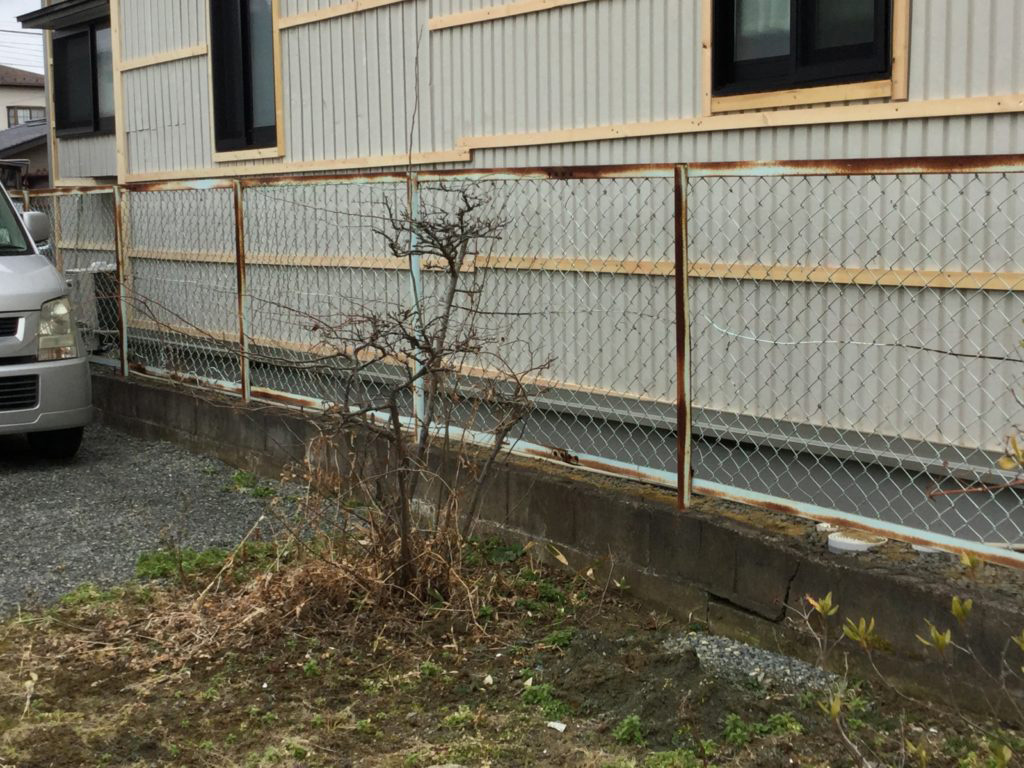 重ね張り施工中の写真