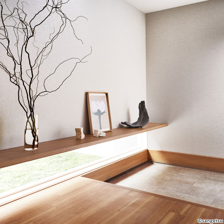 光を受ける壁面に素材感のある壁紙を取り入れた玄関・廊下