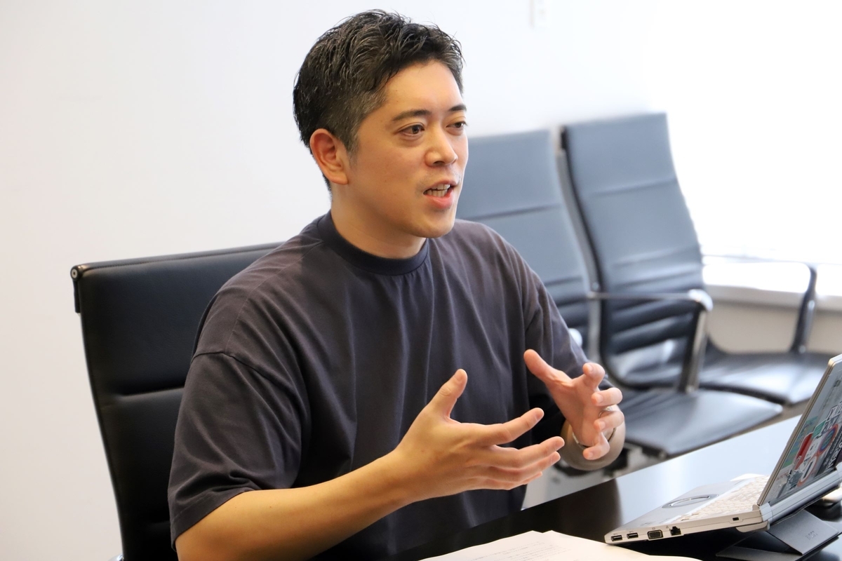 コマーステクノロジー事業本部　矢野 裕さんの写真