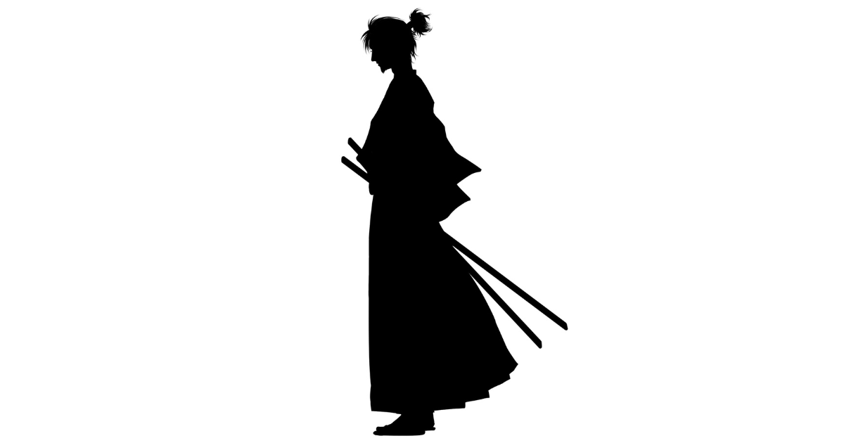大小二本の刀を腰に差した武士のシルエット