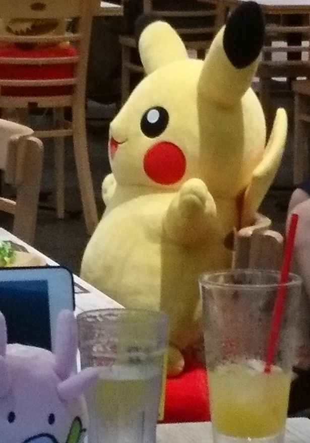 画像　おいしかった！ご満足のピカチュウ