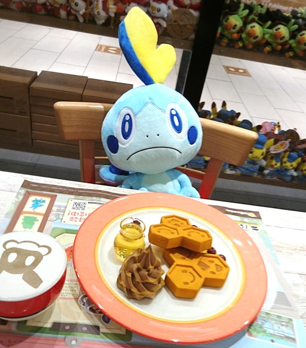 画像　「ミツハニーのはちみつワッフル」を前に途方に暮れるメッソン