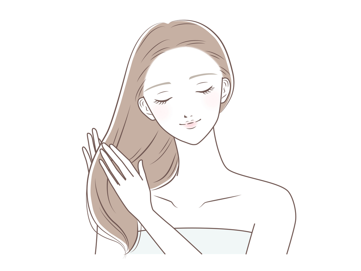 トリートメントをする女性