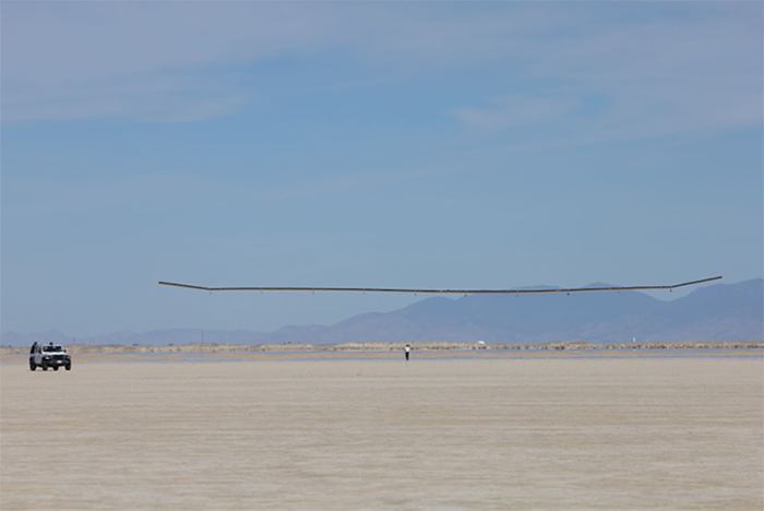 Behind the Scenes: Testing a Sub-scale Model Aircraft to Develop a Next-generation Uncrewed Aircraft System for HAPS