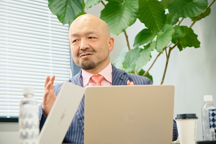 生成AIの役割についてインタビューする時吉秀弥さん