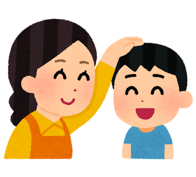 頭をなでてもらう子供