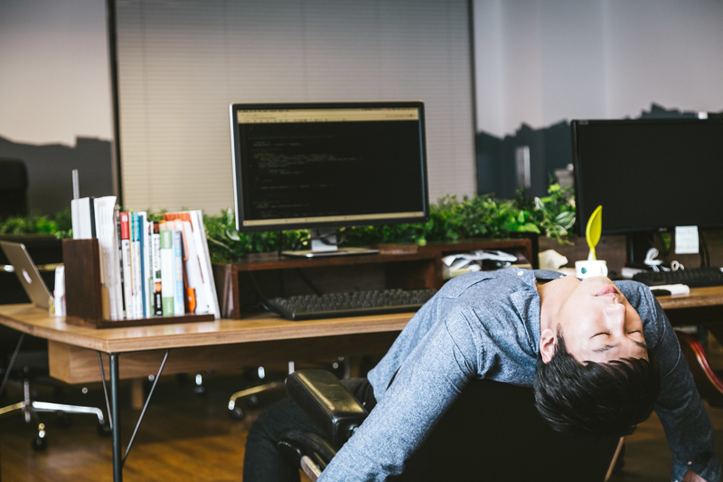 働くことにつかれた人