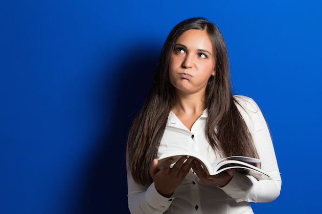 bored female student with book