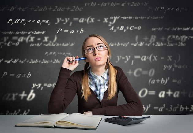 Young student with thoughtful expression sitting at a desk with math formulas over her head