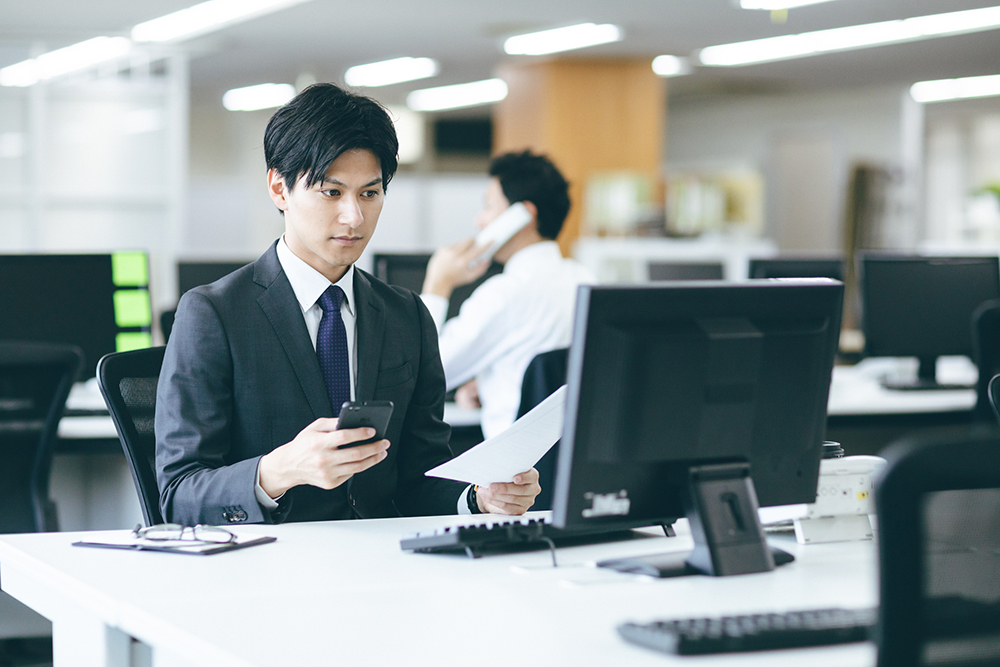 一戸建ての売却査定をする不動産会社のイメージ