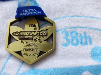 「第28回サロマ湖100kmウルトラマラソン(100kmの部)の完走メダル」の画像