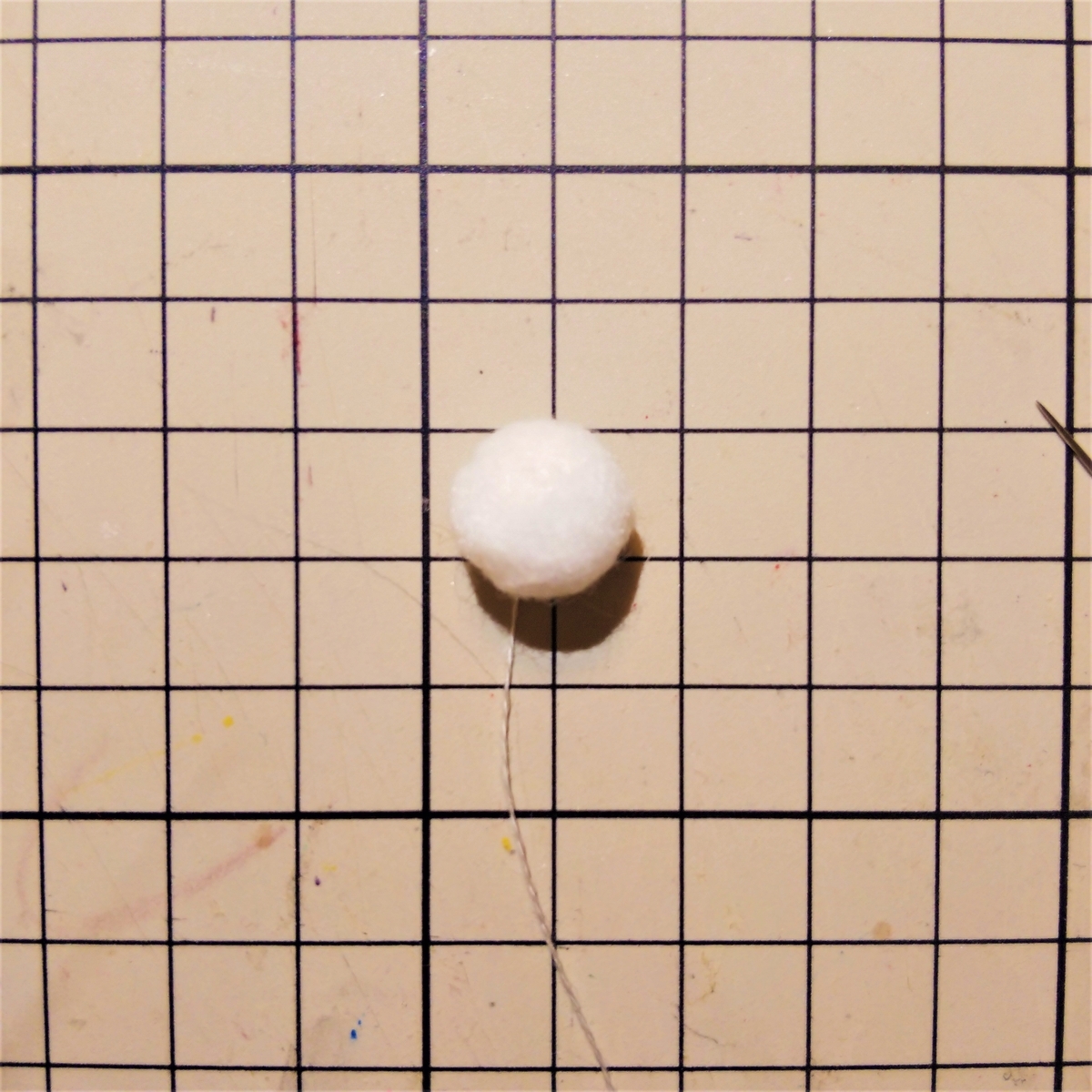 クリームドーナツの作り方⑩ 綿を入れて引き絞る