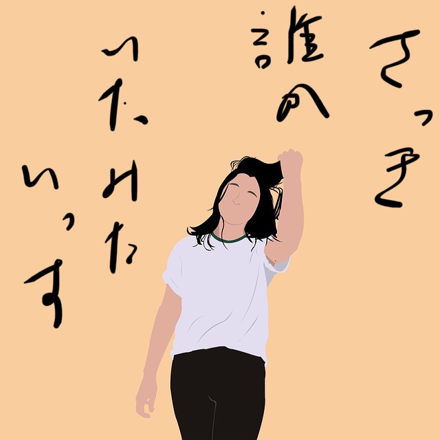 髪をかき上げる女性