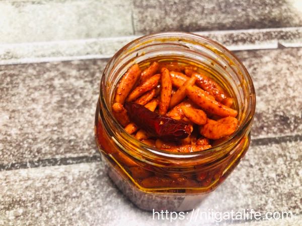 【激辛発売！】柿の種オイル漬けにんにくラー油