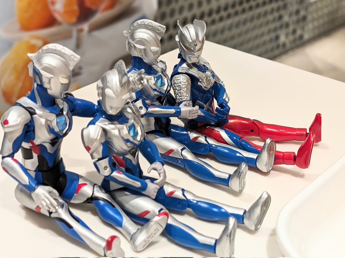 ã¢ã¯ã·ã§ã³ã®ãŒãããã¢ã¯ã·ã§ã³ã®ãŒãã®é£ãã«åº§ã£ãŠè
ãè§Šã£ãŠããã