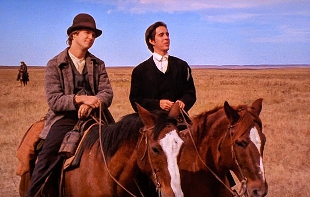 夕陽の群盗 片手にドーナツ 心に花束