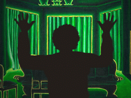 両手を挙げた男