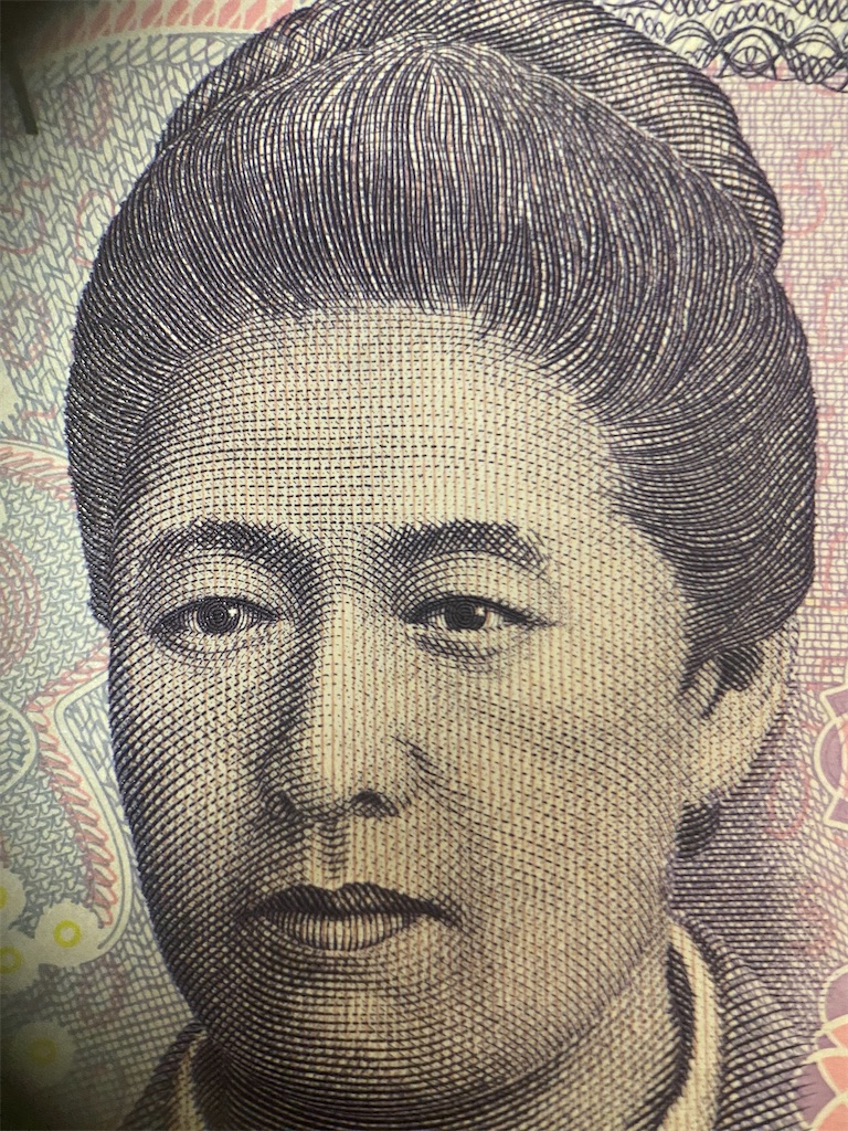 スマホにマクロレンズを付けて撮影した金魚