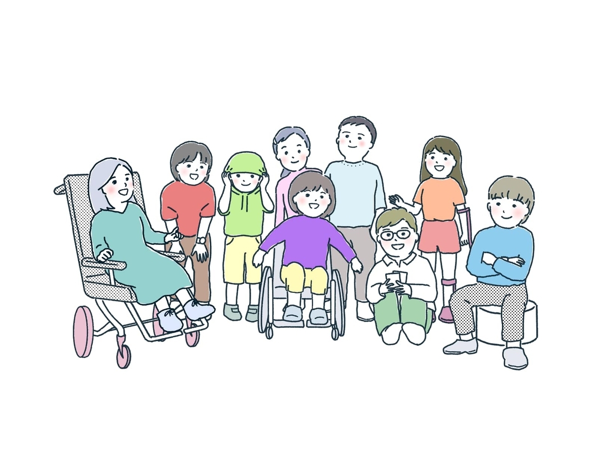 車椅子や支援器具を使用している子どもたちと健常な子どもたちが一緒に楽しそうに座っている様子